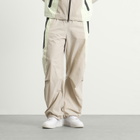 Nike Men's Tech Woven Pro Oversized Pant in Cream/Volt Tint/Black