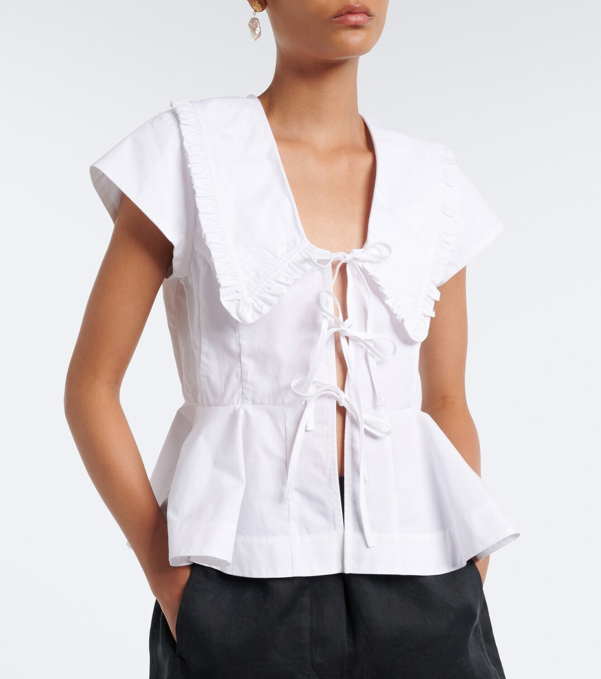 Ganni Bow-detail peplum cotton poplin blouse