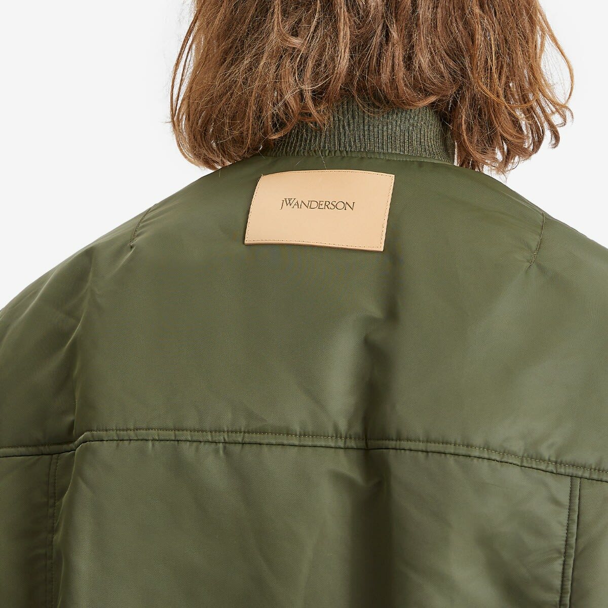 JW Anderson Men's Oversized Curved Hem Bomber Jacket in Olive