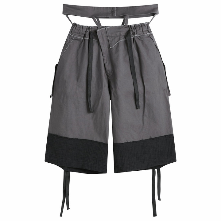 Photo: Ottolinger Women's Baggy Cargo Shorts in Black-Grey