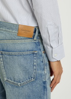 Saint Laurent Tapered-leg Denim Jeans Indigo