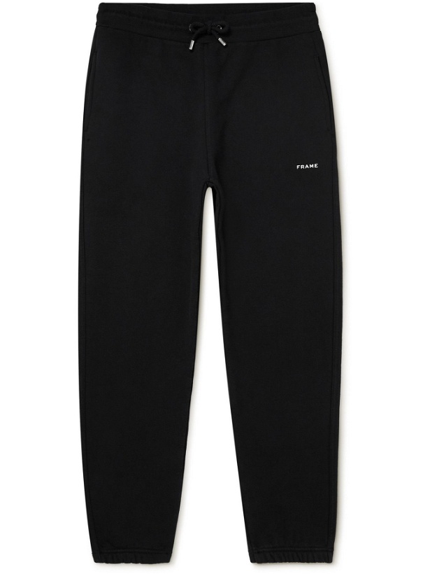 Photo: FRAME - Tapered Logo-Print Fleece-Back Cotton-Blend Jersey Sweatpants - Black