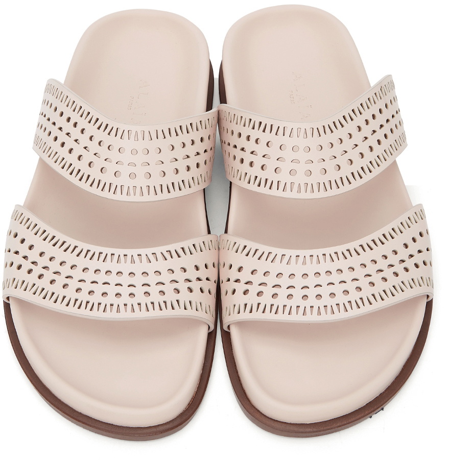 ALAIA PERFORATED SLIDE SANDALS 25S IN PINK BEIGE SUEDE