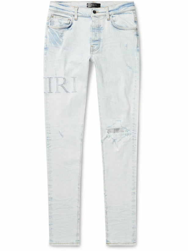Photo: AMIRI - Skinny-Fit Logo-Appliquéd Crystal-Embellished Distressed Jeans - Blue
