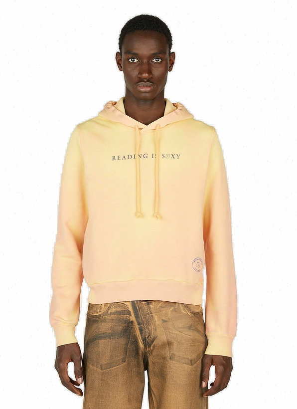 Photo: Acne Studios - Heat Reactive Hooded Sweatshirt in Orange