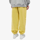Nike Men's Solo Swoosh Fleece Pant in Saturn Gold/White