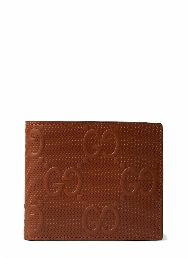 Photo: Gucci - GG Embossed Bifold Wallet in Brown