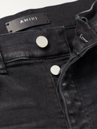 AMIRI - Skinny-Fit Distressed Paint-Splattered Jeans - Black