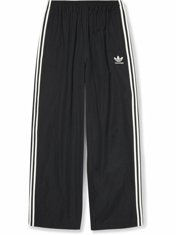 Photo: Balenciaga - adidas Wide-Leg Striped Logo-Print Cotton-Blend Shell Track Pants - Black