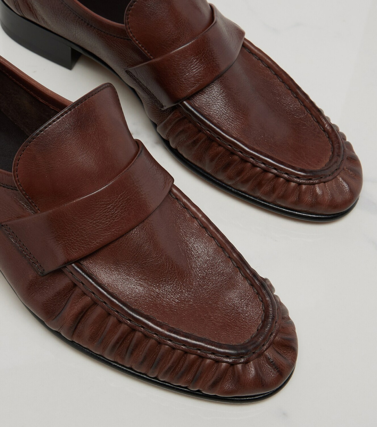 The Row Soft ruched leather loafers