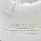 Woman by Common Projects Women's Decades Low Trainers Sneakers in White