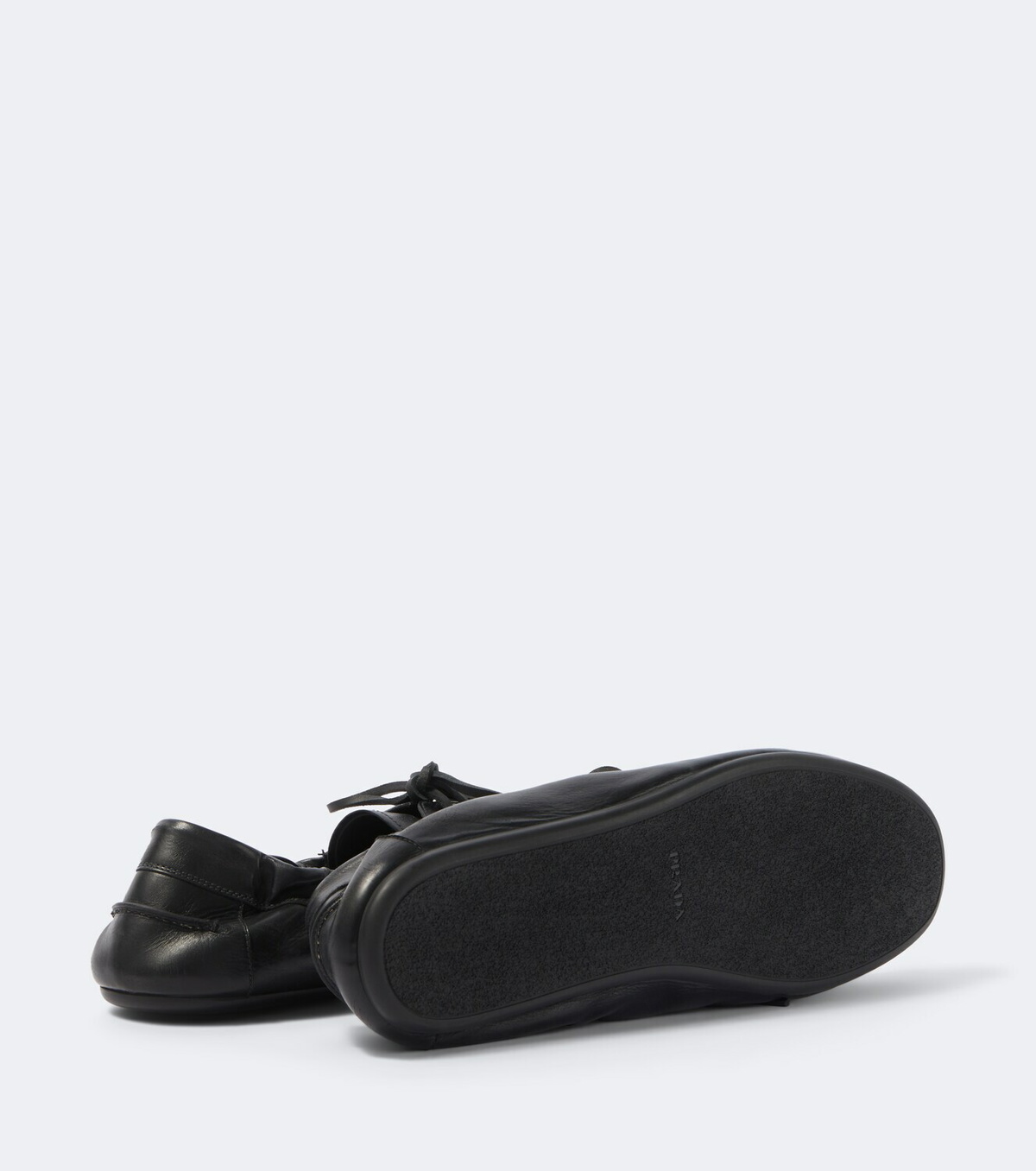 Prada Shuffle leather loafers