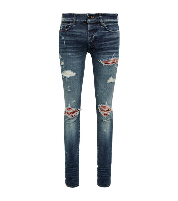 Photo: Amiri - Distressed skinny jeans