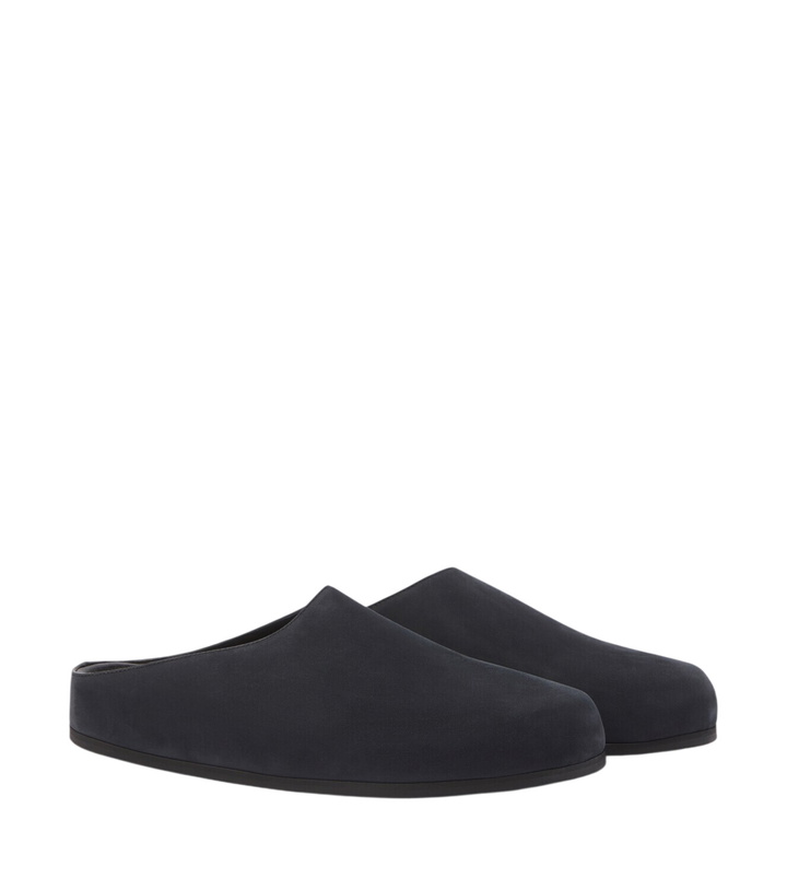 Photo: Studio Nicholson Wearing leather mules