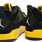 Air Jordan 4 Retro PS Sneakers in Black/Tour Yellow