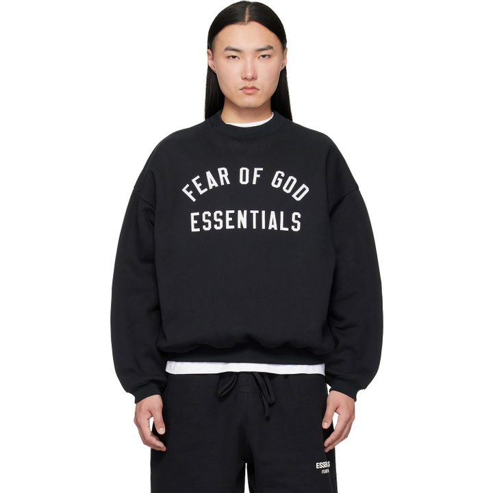 Photo: Fear of God ESSENTIALS Black Varsity 90s Crewneck Sweatshirt