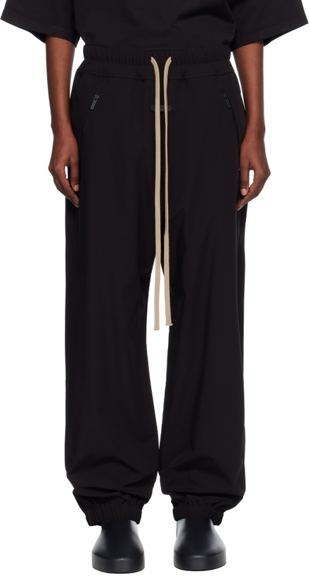 Photo: Fear of God Black Nylon Track Pants