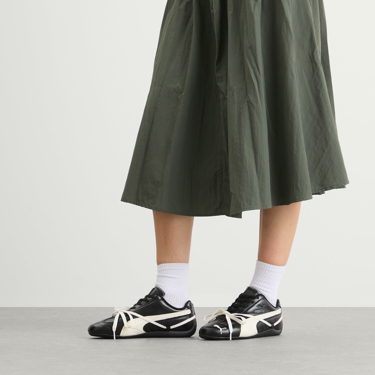 Puma Women's x ROSÉ Speedcat Sneaker in Black &Warm White