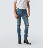 Amiri MX1 distressed skinny jeans