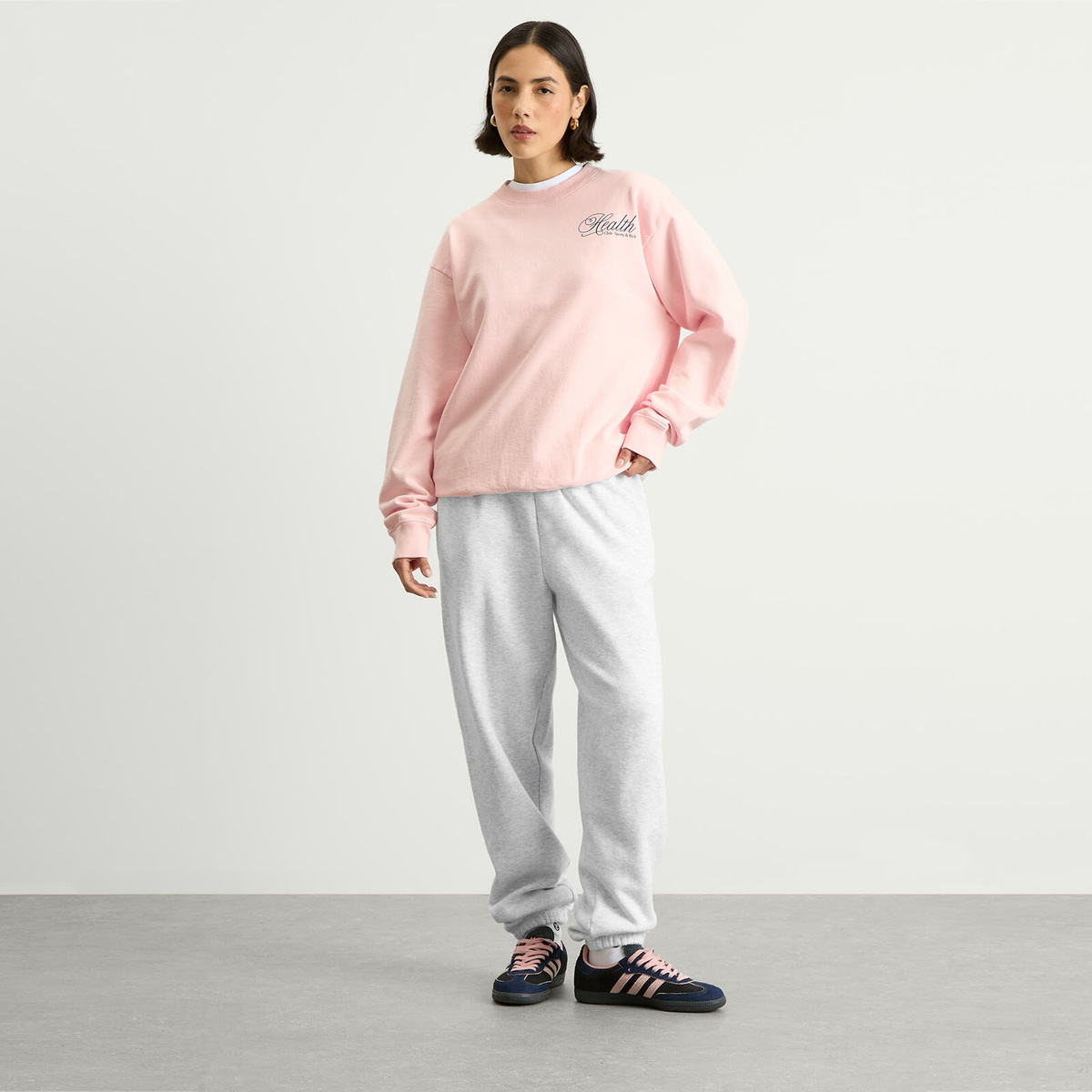 Sporty & Rich Women's Health Script Crew Sweatshirt in Pink Dolphin
