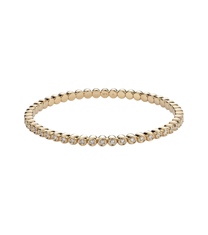 Photo: Bucherer Fine Jewellery Stretchy 18kt gold bracelet with diamonds
