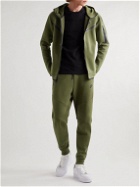 Nike - Sportswear Tapered Logo-Print Cotton-Blend Tech-Fleece Sweatpants - Green