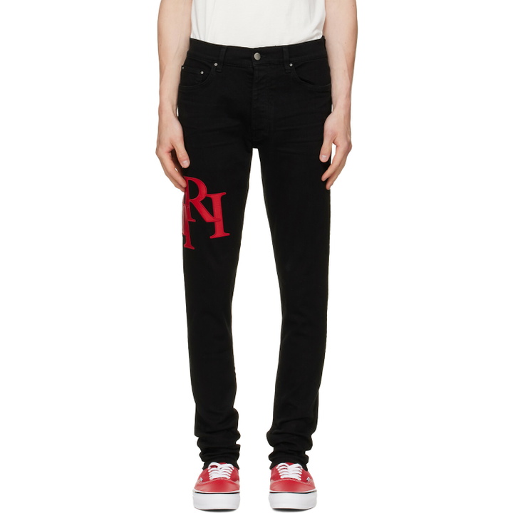Photo: AMIRI Black Staggered Logo Skinny Jeans