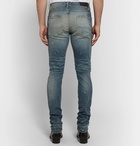 AMIRI - Skinny-Fit Appliquéd Panelled Distressed Stretch-Denim Jeans - Men - Mid denim