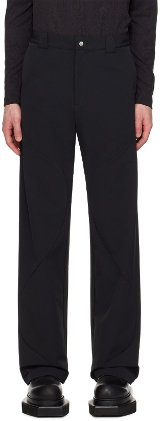 Photo: Uncertain Factor Black Roll Trousers