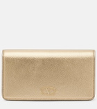 Valentino Garavani VLogo Mini metallic leather clutch