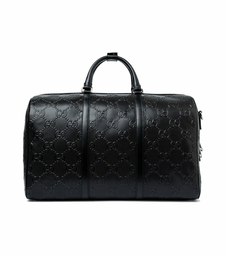 Photo: Gucci - GG embossed leather duffel bag