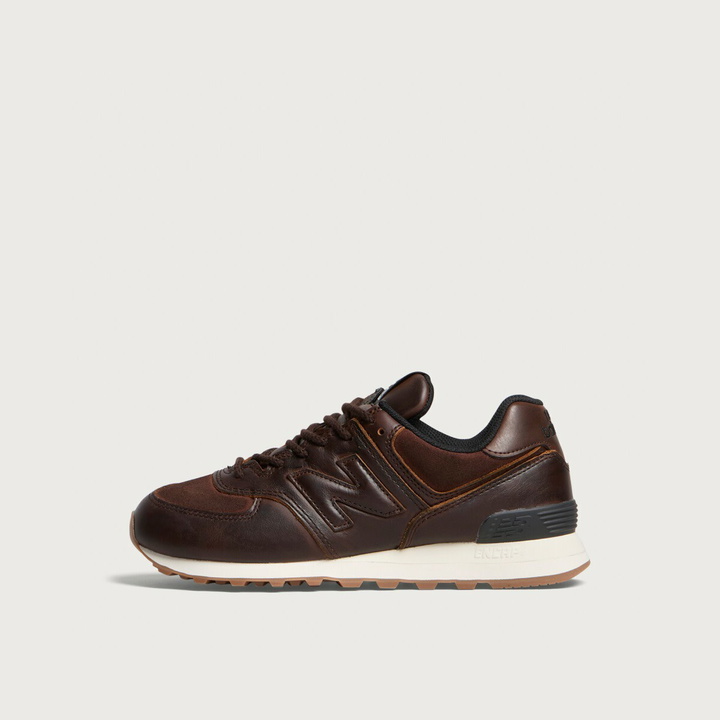 Photo: New Balance Women's 574 Sneaker in Pumpernickel/Sea Salt