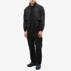 Nike Men's Solo Swoosh Woven Track Jacket in Black/White