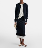 Bottega Veneta Andiamo leather-trimmed raffia clutch