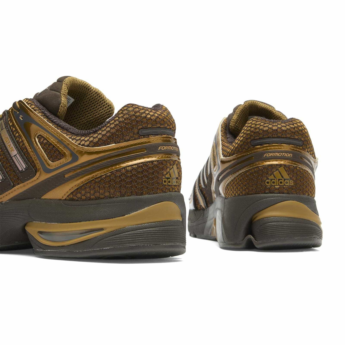 Adidas Men's Adistar Control 5 Sneaker in Bronze Strata/Aurora Coffee/Dark Brown