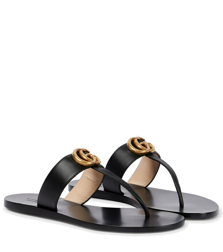 Photo: Gucci - Double G leather thong sandals