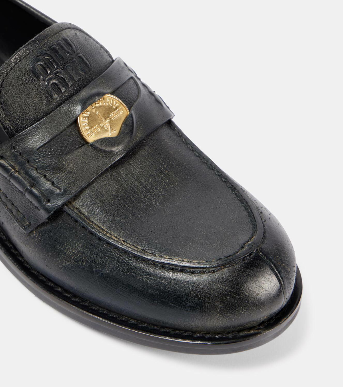 Miu Miu Leather penny loafers Miu Miu display picture 2