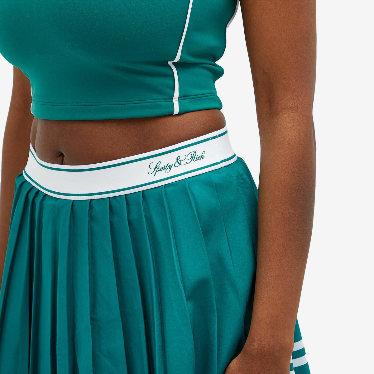 Sporty & Rich Women's Vendome Script Pleated Skirt in Alpine Alpine
