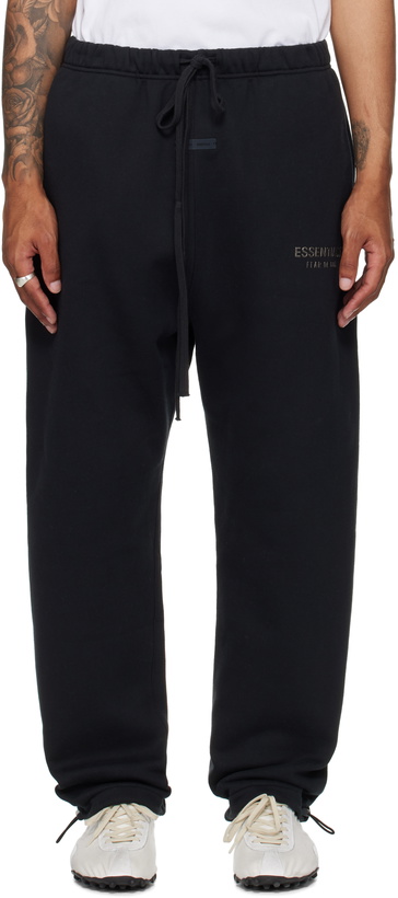 Photo: Fear of God ESSENTIALS Black Relaxed Fleece Sweatpants