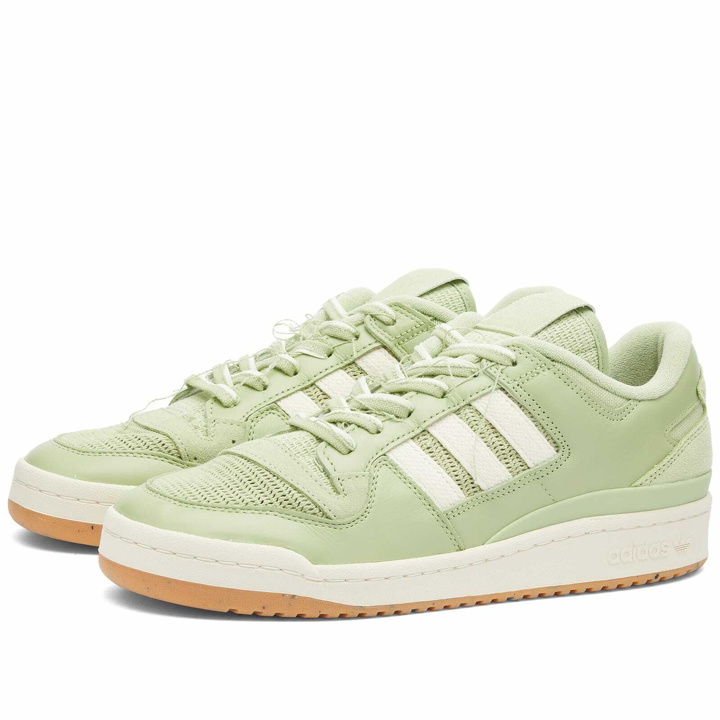 Photo: Adidas Men's Forum 84 Low CL Sneakers in Magic Lime/White