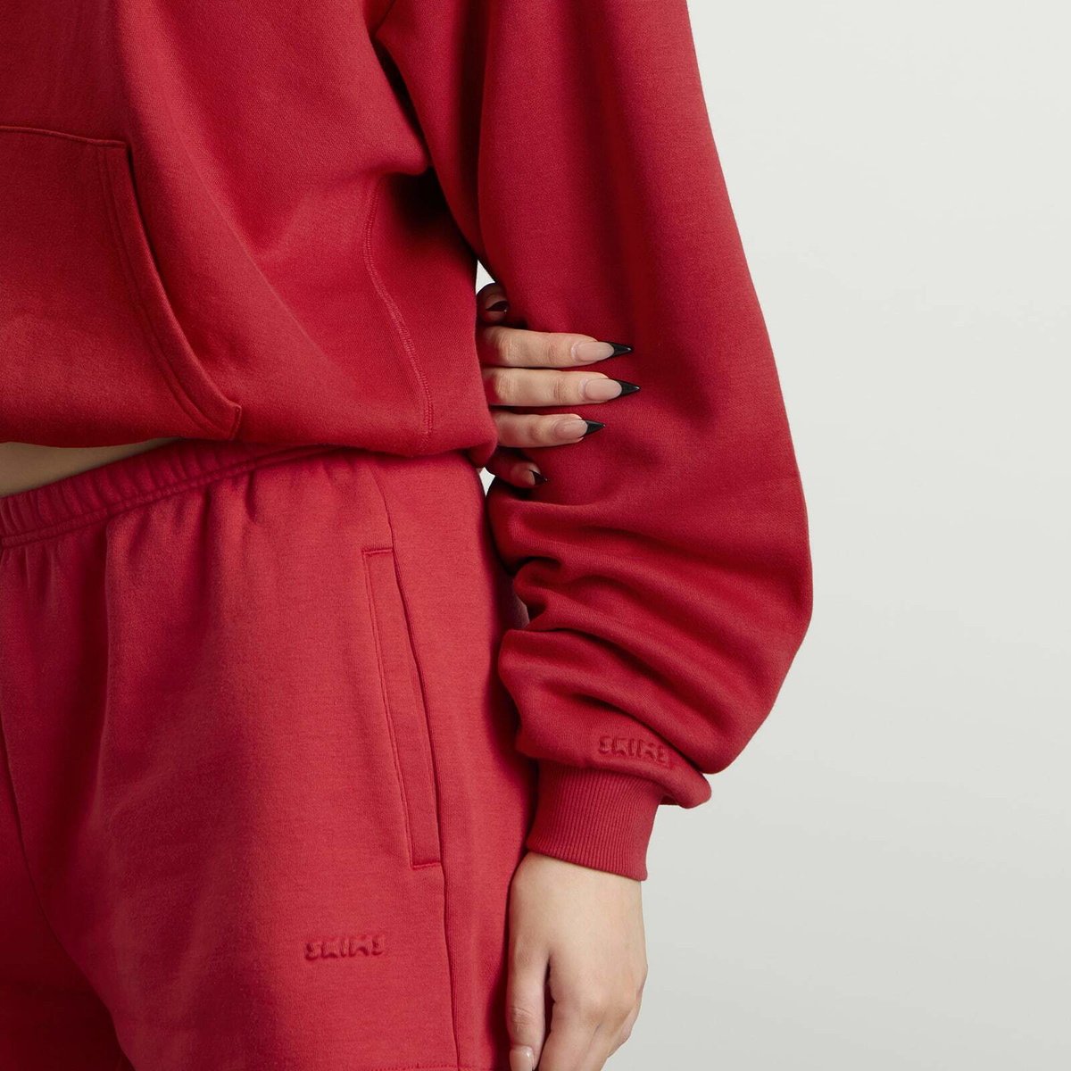 SKIMS Women's Cotton Fleece Classic Zip Up Hoodie in Washed Red