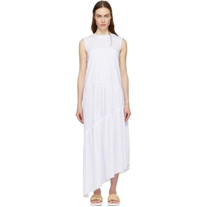Photo: Cedric Charlier White Ruffle Asymmetric Dress