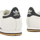 Adidas Kick Sneakers in Core White/Core Black/Gum