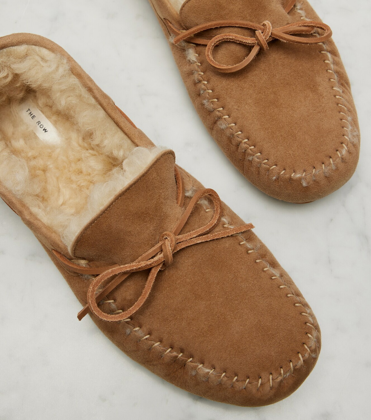 The Row Lucca shearling-trimmed suede boat shoes
