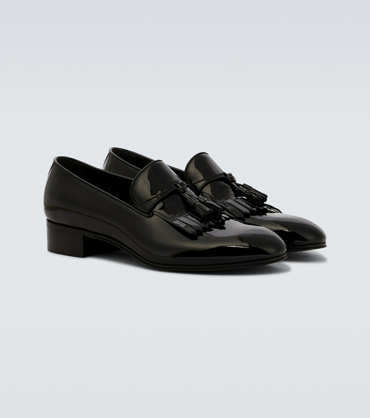 Gucci - Tasseled patent leather loafers