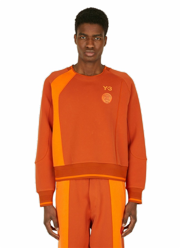 Photo: Logo Motif Crewneck Sweatshirt in Orange