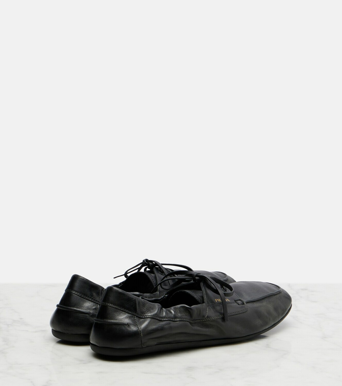 Prada Shuffle leather boat shoes