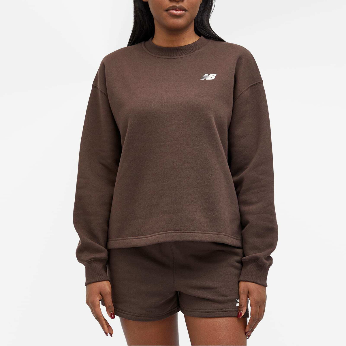 New Balance Women's Linear Heritage Brushed Back Fleece Crewneck in Black Coffee