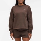 New Balance Women's Linear Heritage Brushed Back Fleece Crewneck in Black Coffee