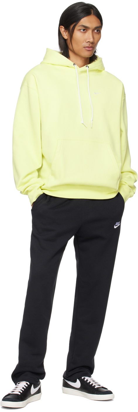 Nike yellow best sale swoosh hoodie